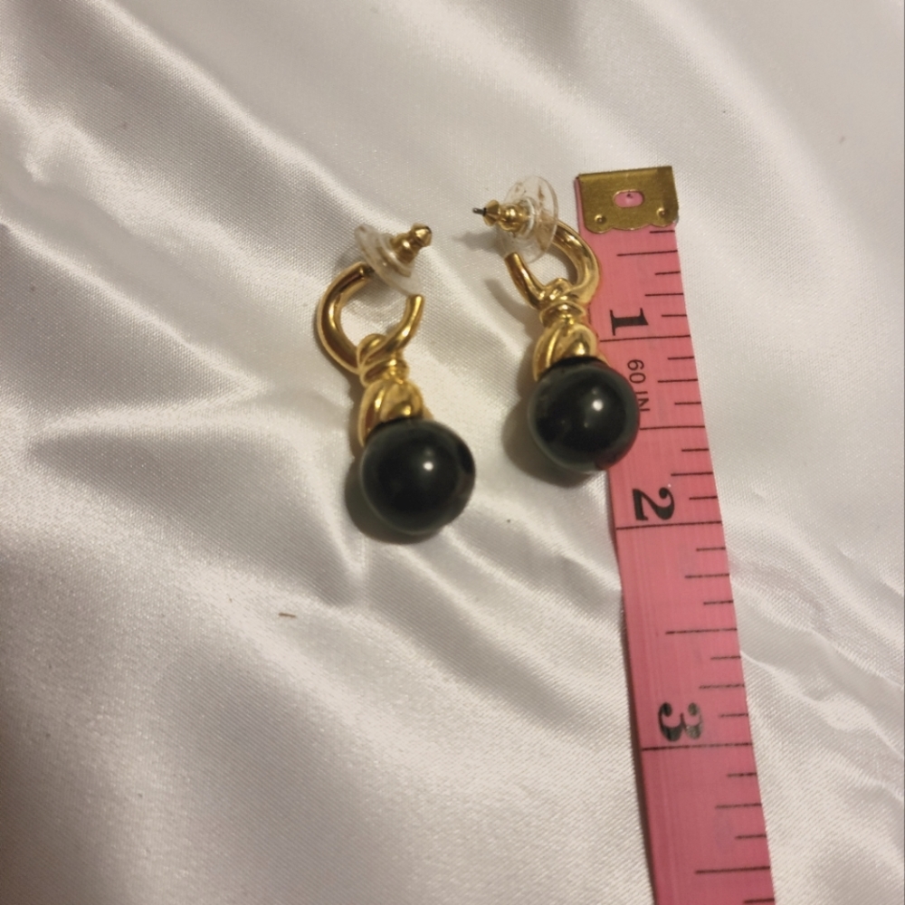 Avon vintage 4 pair in one. These earrings can give you four different looks.